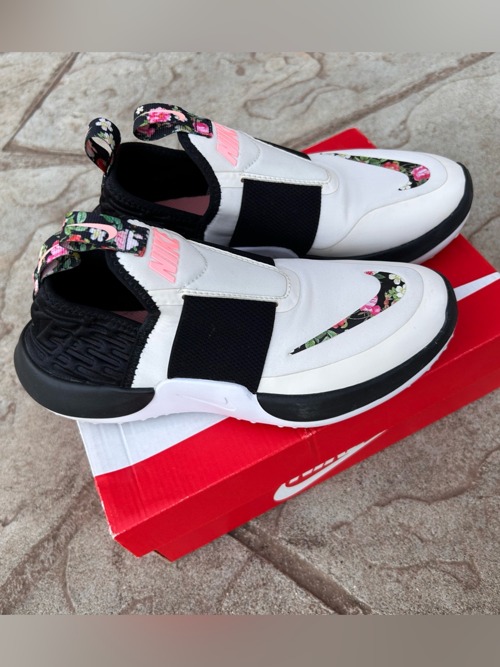 Nike Women’s Slip-On Floral Swoosh Sneakers in cream, Black and Pink